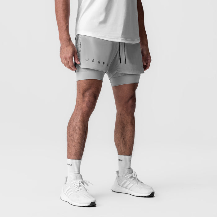 Tetra-Lite 5" Liner Short in slate grey, worn with white sneakers and socks, front view