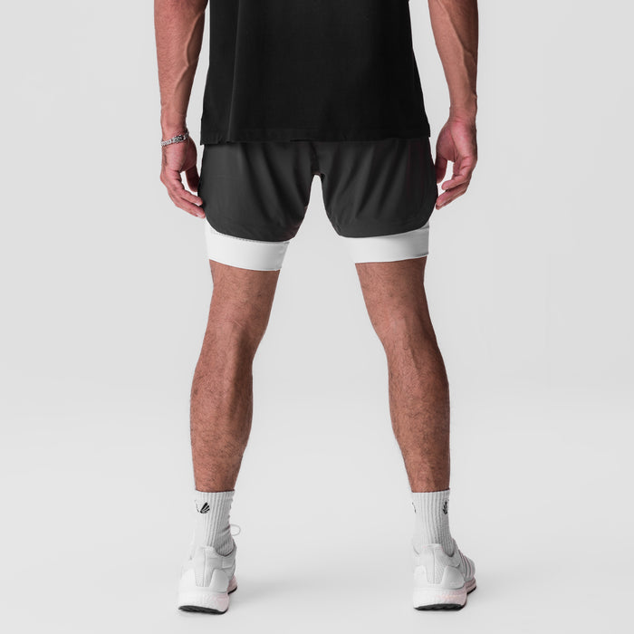 Tetra-Lite 5" Liner Short in Space Grey with White stripe, back view on model