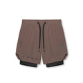 flatlay Tetra-Lite 7" Liner Short in Deep Taupe and Black, front view