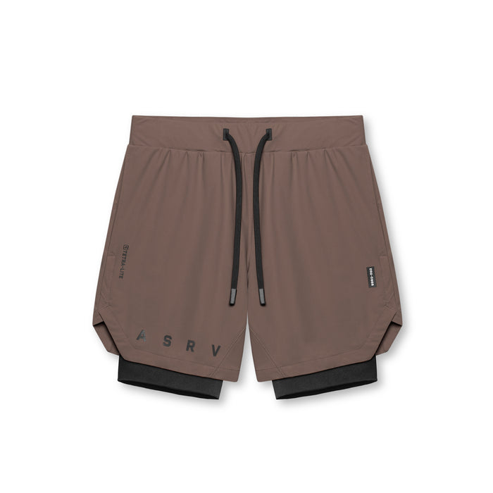 flatlay Tetra-Lite 7" Liner Short in Deep Taupe and Black, front view