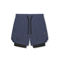 flatlay Tetra-Lite 7" Liner Short in navy and black, front view