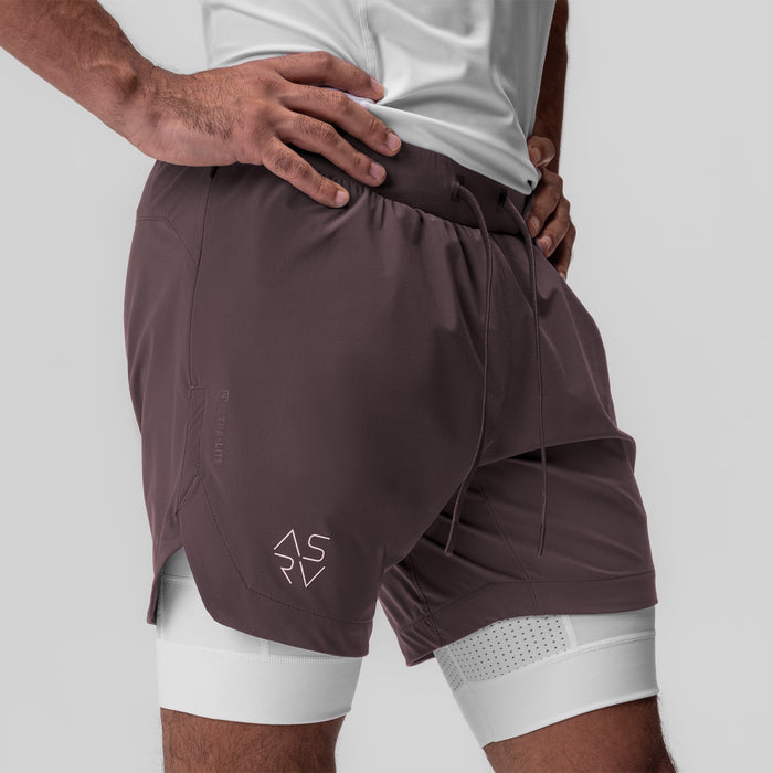 Tetra-Lite 7" Liner Short in Nightshade/White, modeled from side waist view