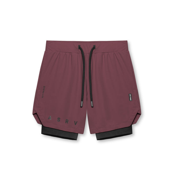 flatlay Tetra-Lite® 7" Liner Short in plum and black, overhead view