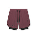 flatlay Tetra-Lite® 7" Liner Short in plum and black, overhead view