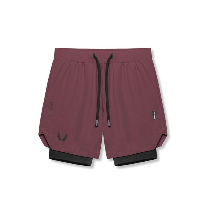 flatlay Tetra-Lite 7" Liner Short in Plum and Black, front view