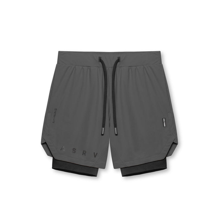Flatlay of Tetra-Lite 7" Liner Shorts in Space Grey and Black, top view