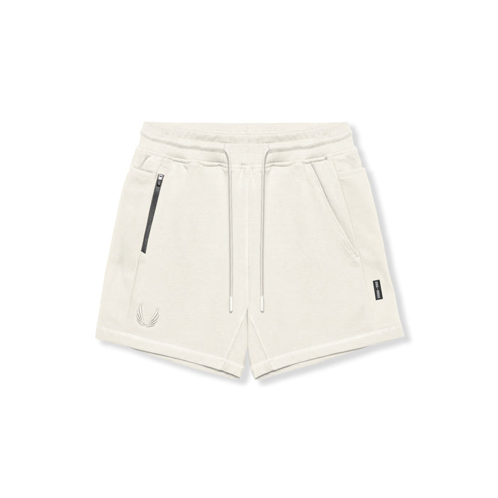 Flatlay of Tech-Terry Sidelock Sweat Shorts in ivory cream, top view