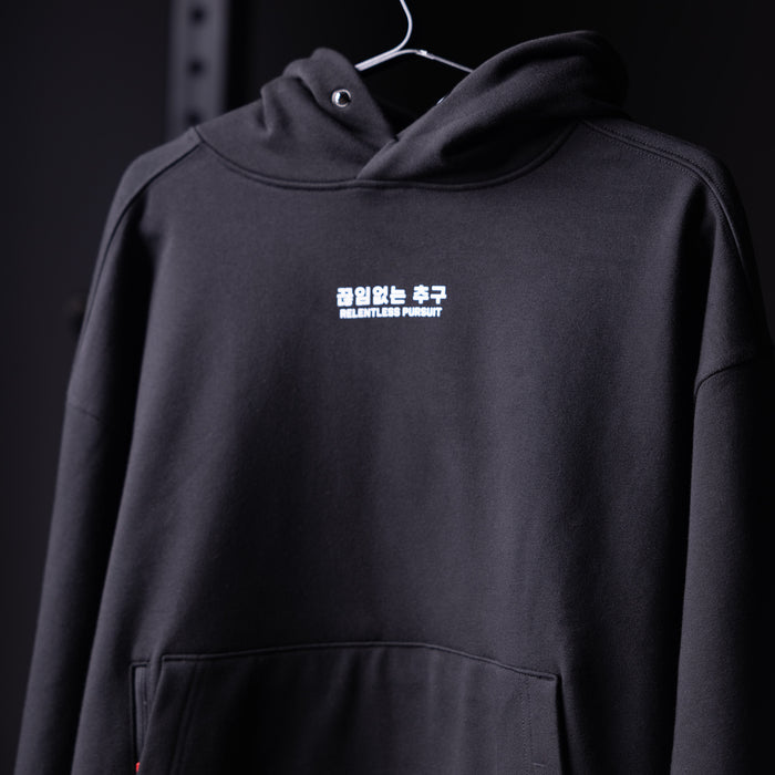 Flatlay Tech-Terry™ Zip Pocket Hoodie in black, front view on hanger
