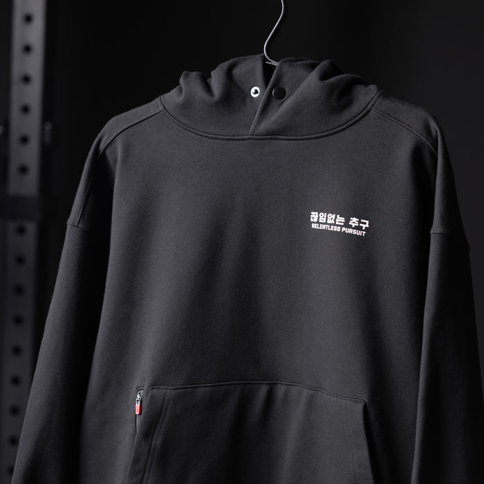 Flatlay Tech-Terry Zip Pocket Hoodie in black with Korean text graphic, front view