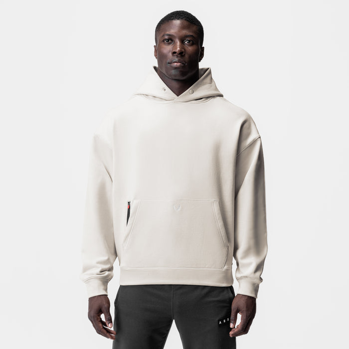 Tech-Terry Zip Pocket Hoodie in Stone worn by model, front view