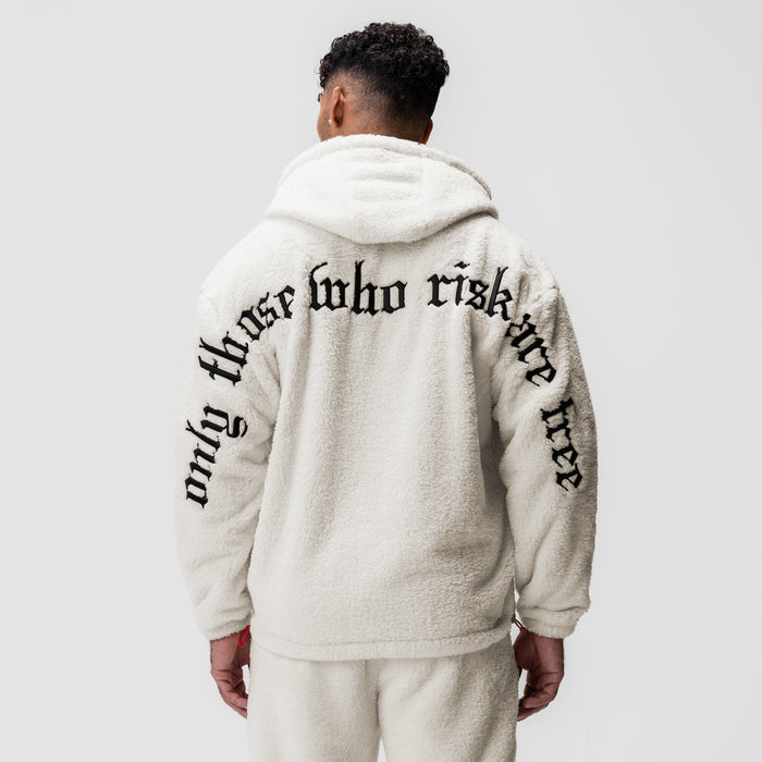 Sherpa Recovery Full Zip Hoodie in ivory cream with black text, back view on model
