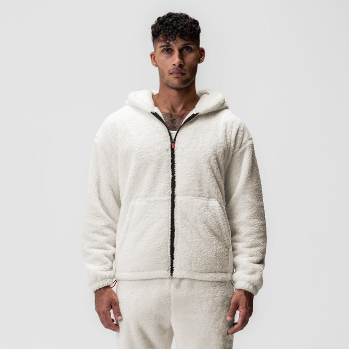 Sherpa Recovery Full Zip Hoodie in ivory cream worn by model, front view