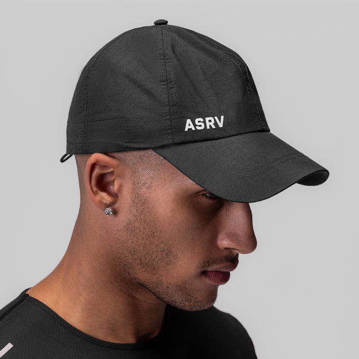 Weather-Ready Cinch Hat in black worn by model in profile view