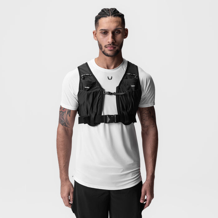 2-in-1 Packable Run Vest in black, front view on model