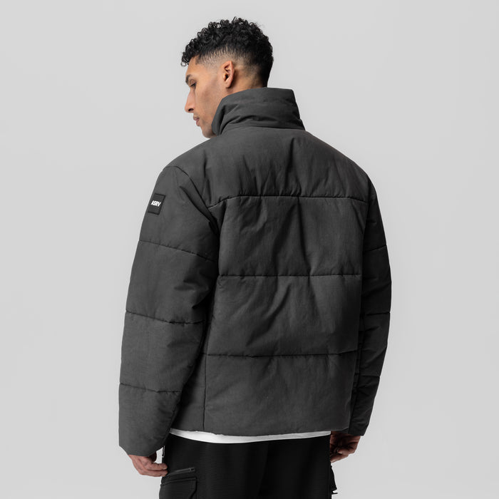 PrimaLoft® Weather-Ready Puffer Jacket in black, rear view on model
