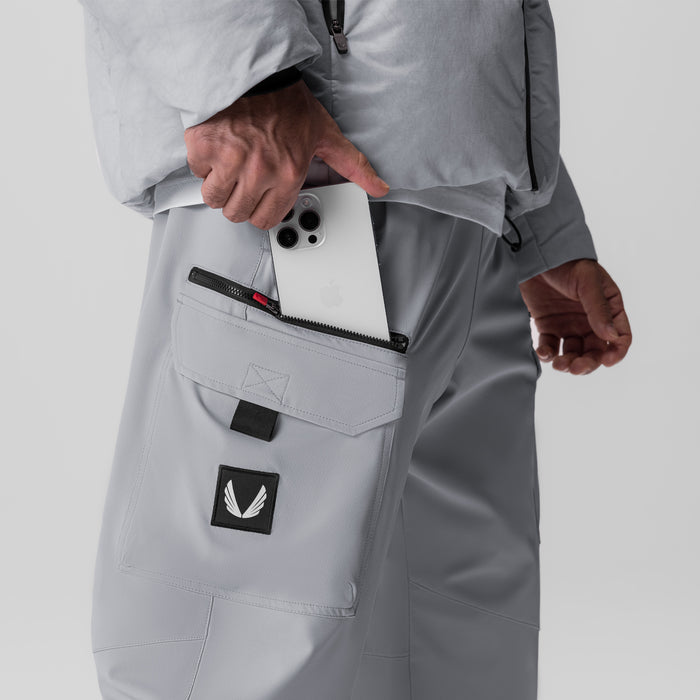 Tetra Weather-Ready City Pant in slate grey, worn by model showing pocket storage detail