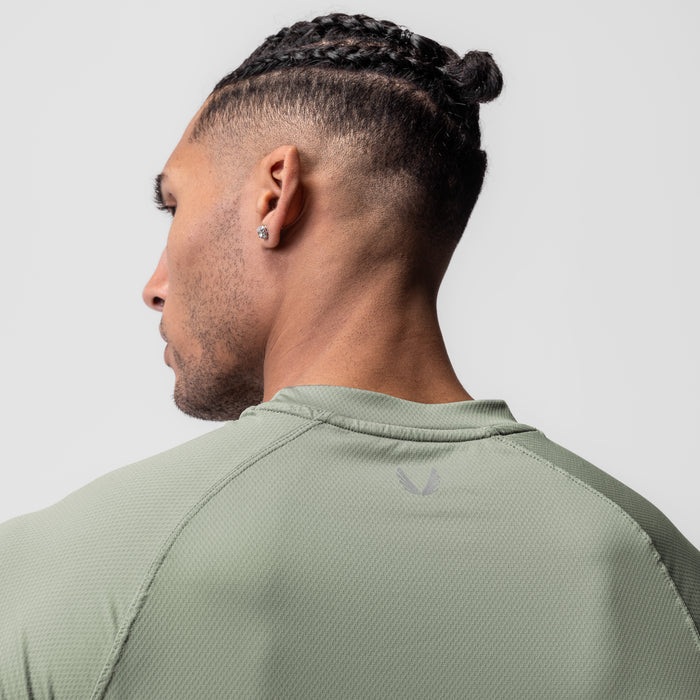 AeroSilver® Fitted Tee in sage worn by model, side profile view