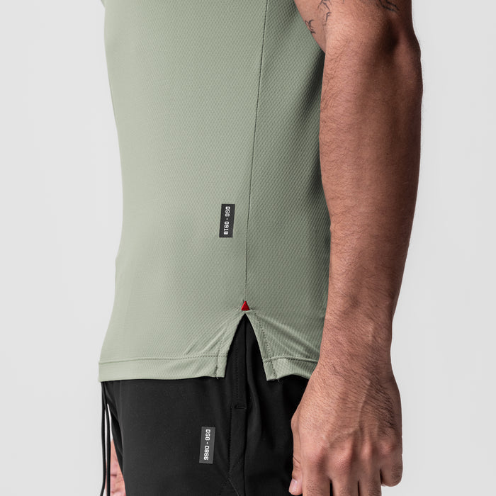 AeroSilver Fitted Tee in sage, worn by model showing side view and fit