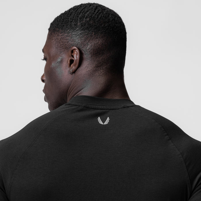Supima Fitted Tee in black, back view on model
