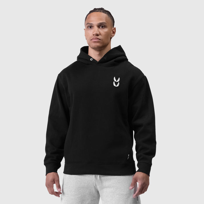 Black Tech Essential Distressed Hoodie worn by model, front view
