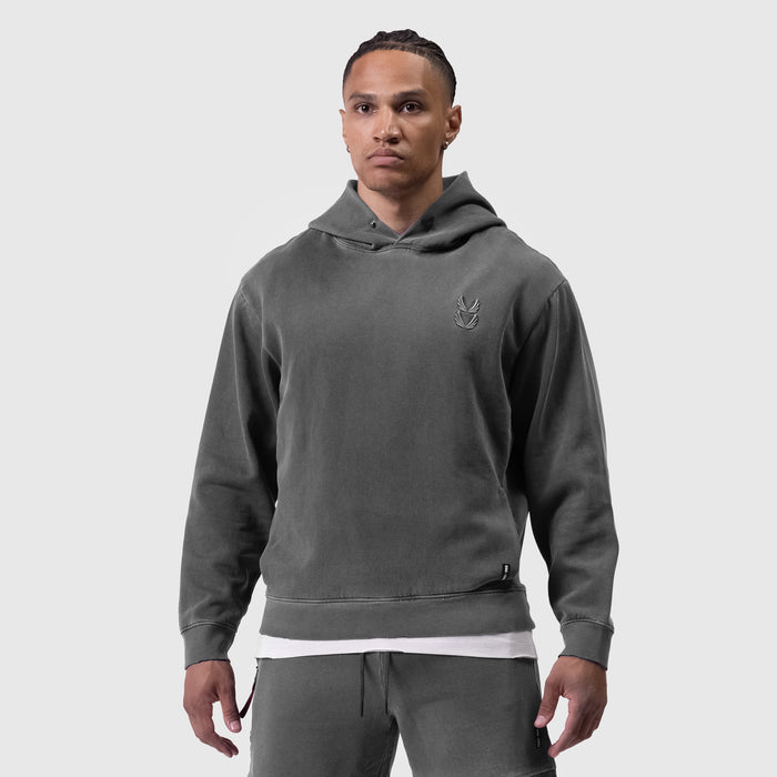 Tech Essential Distressed Hoodie in faded grey worn by male model, front view