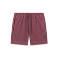 flatlay Tech Essential Sweat Short in faded crimson, front view