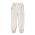 flatlay Tech Essential Sweats joggers in faded stone, front view
