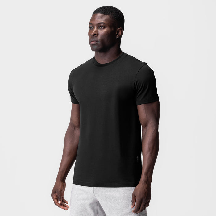 Black Supima Essential Tee worn by model, front view