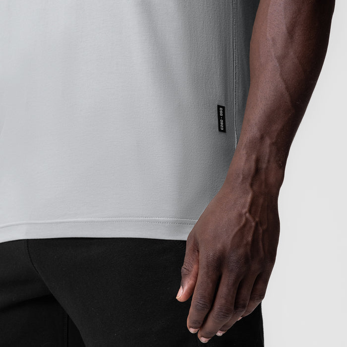 Supima Essential Tee in Slate Grey worn by model, side view showing fit and fabric detail