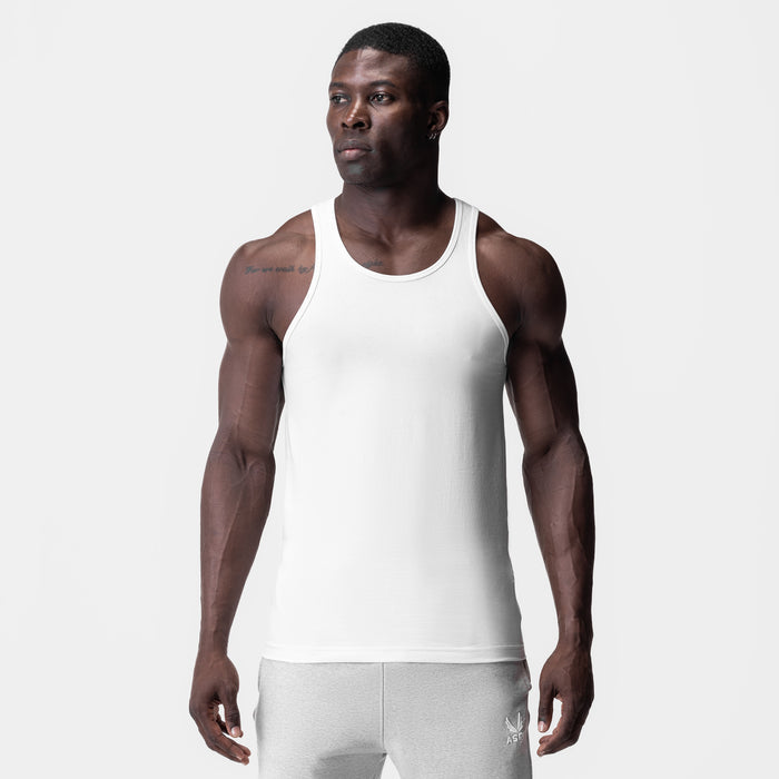 White Supima Essential Slim Tank worn by model, front view