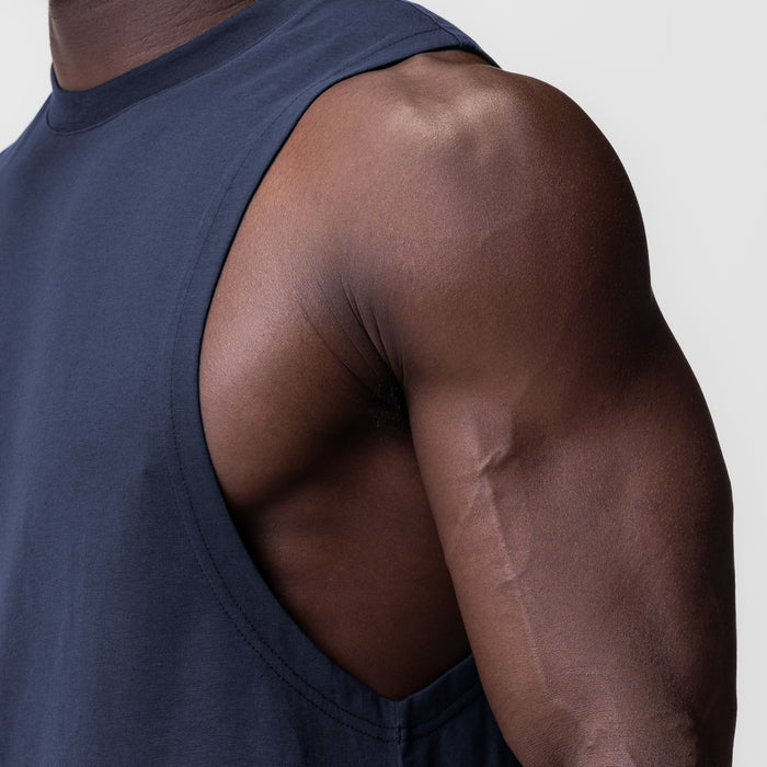 Supima® Muscle Tank in navy, worn by model showing shoulder and arm detail