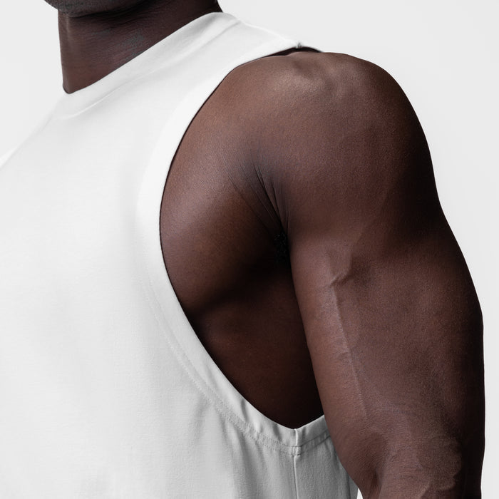 White Supima® Muscle Tank worn by model, side view showing fit
