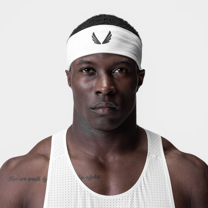 WarpFlexx Headband in white with wings logo, worn by male athlete in white tank top