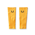 Flatlay of Body-Mapped Calf Sleeve in amber yellow with striped texture detail, laid flat on white background