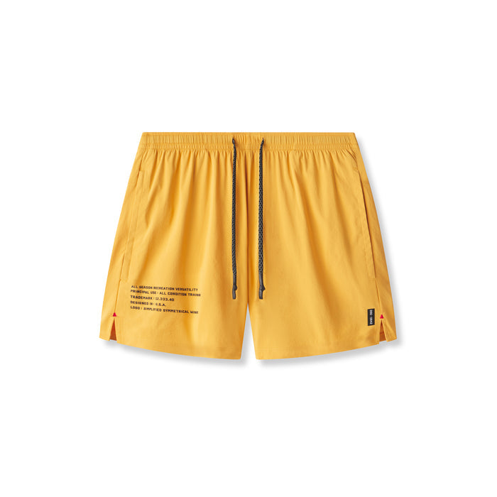 flatlay Aerotex™ 5" Training Short in amber yellow, front view