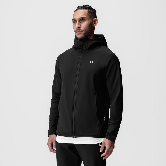 Performance Fleece Zip Hoodie in black worn by male model, front view