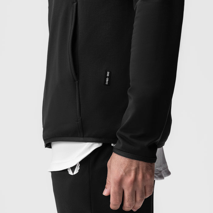Performance Fleece Zip Hoodie in black, worn by model showing sleeve and cuff detail