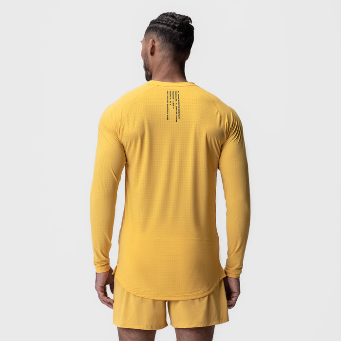 Laser-Vent Established Long Sleeve in amber yellow, back view on model