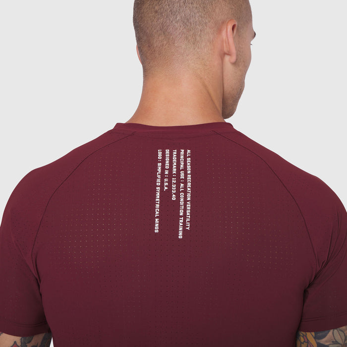 Laser-Vent Established Tee in crimson worn by male model, back view