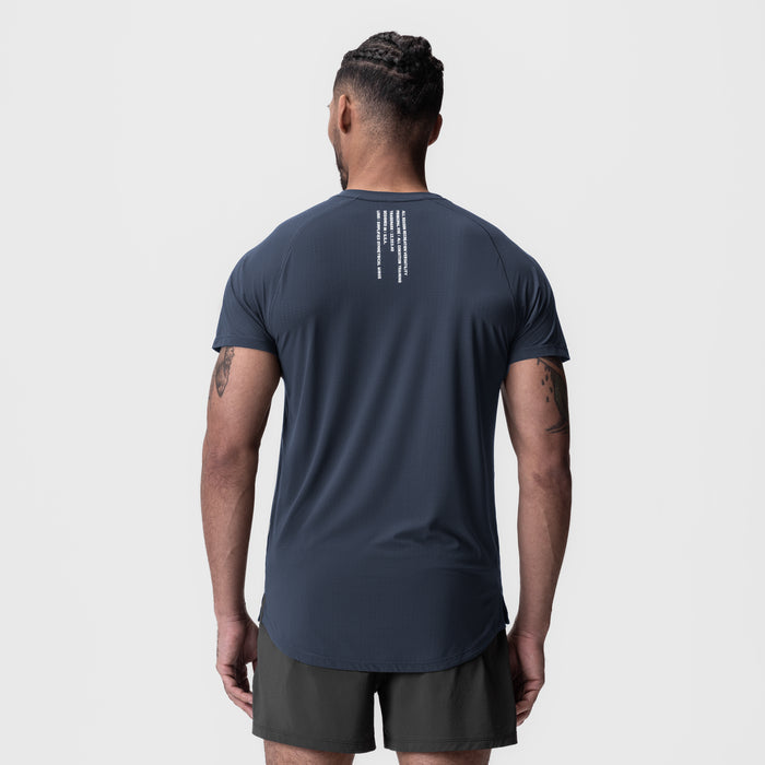 Navy Laser-Vent Established Tee worn by model, back view showing text detail