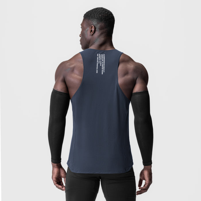 Laser-Vent™ Singlet Tank in navy worn by model from back, showing ribbed texture and back print detail