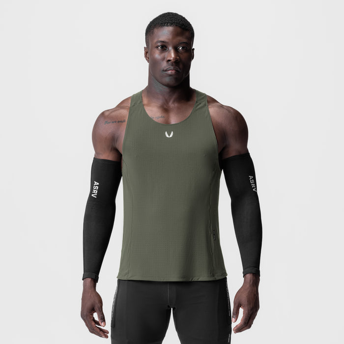 Laser-Vent Singlet Tank in olive worn by male model with black arm sleeves, front view
