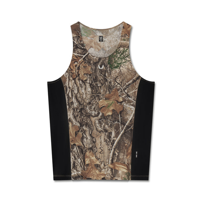 Flatlay of Laser-Vent Singlet Tank in Realtree Edge camo with black sides, front view