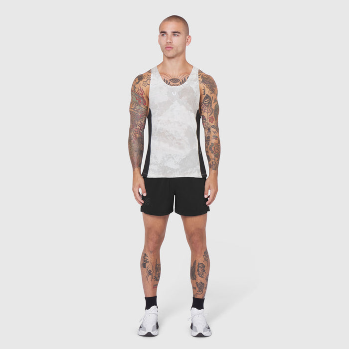 Laser-Vent Singlet Tank in white with black sides, worn by model with full-body front view