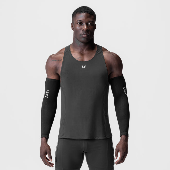 Laser-Vent™ Singlet Tank in space grey worn with black arm sleeves, front view