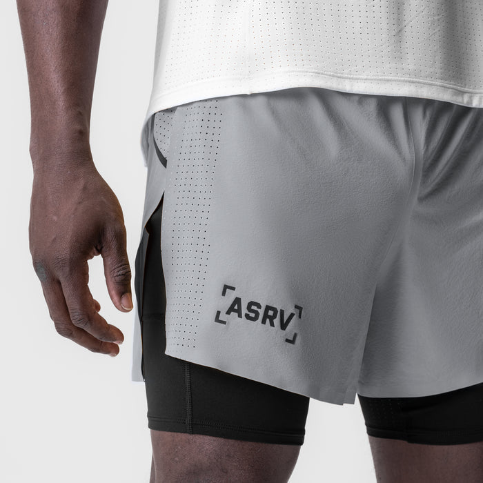 ASRV Aerotex 4" High Split Liner Short in slate grey, worn by model, side view