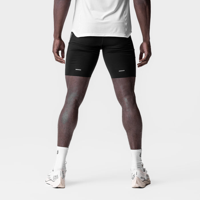 WarpFlexx® Utility Speed Short in black, worn by model standing from behind