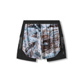 flatlay Aerotex Hybrid Liner Short in black with Realtree Aspect camo print, front view