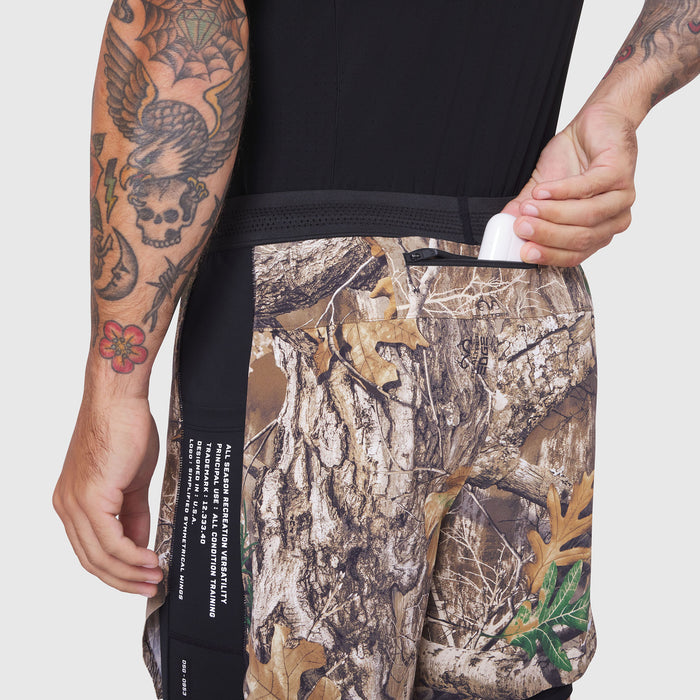 Aerotex Hybrid Liner Short in Realtree Edge camo, worn by model showing side detail