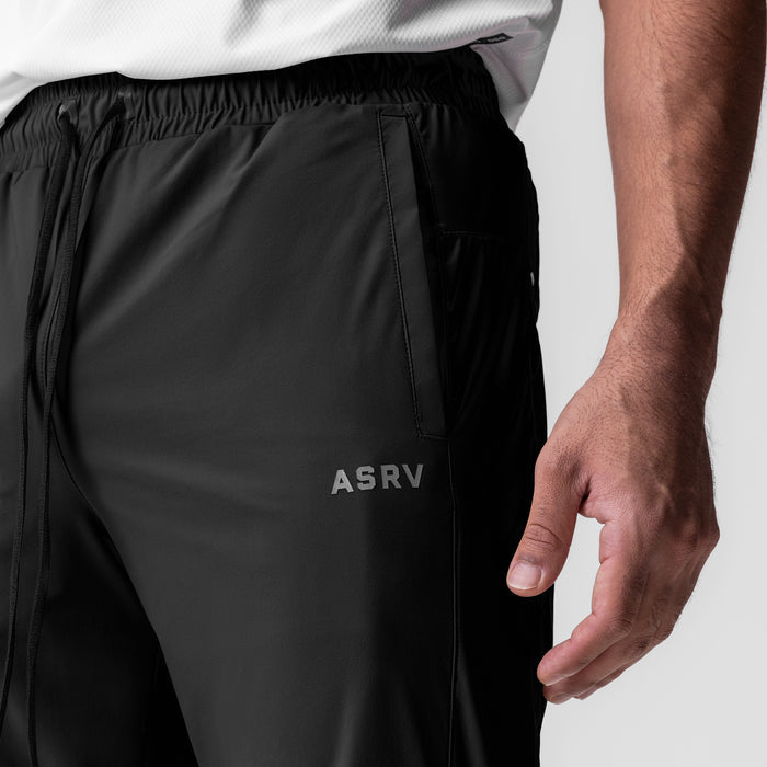 Black Tetra-Lite Moto Jogger worn by model, side detail view showing ASRV branding